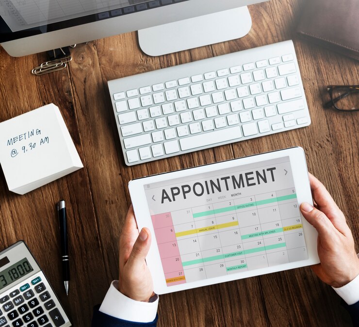 Photo depicting a professional setting an appointment, symbolizing KU Key Unlocks' expert appointment setting services that connect businesses with valuable B2B leads.